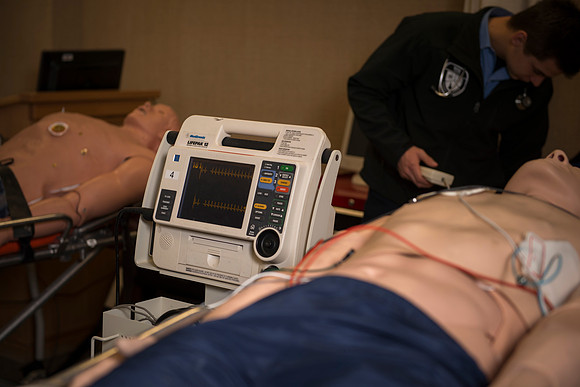 Cory Marriott and his peer pass off EMT requirements during lab held in the Clarke Building.