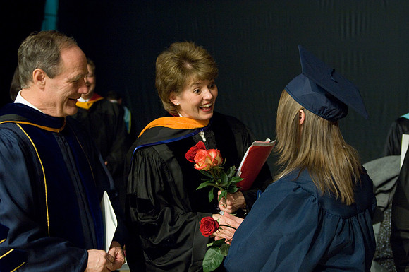 Kassie Burton a Nursing graduate from Muscatine, Iowa greets Br. &amp; Sis Tanner after the colege of Agriculture and Life Sciences Convocation.