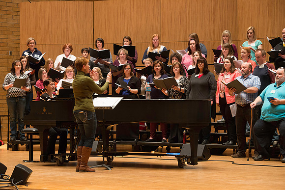 Ricks College Alumni from 1965 to 1995 gather for an A Cappella Choir reunion.