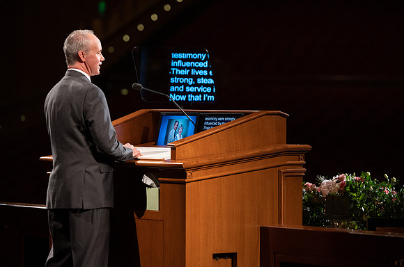 Robert Tueller of the Music Department records his devotional talk.