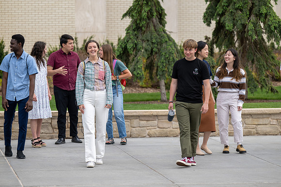 Student models for Admissions Viewbook cover options. May 2023