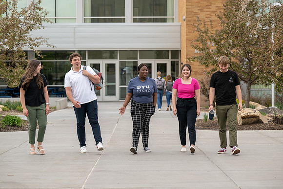 Student models for Admissions Viewbook cover options. May 2023
