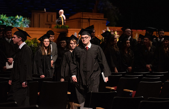 Student Graduates and Faculty meet in the I-Center for Commencement.