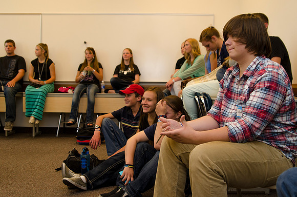 Participants in the Education Week 2013 Youth Program meet together in the Gordon B. Hinckley Building. Photo by Taylor Davenport