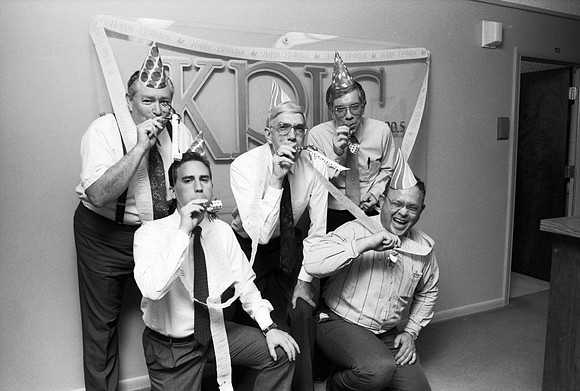 KRIC Radio members celebrating the anniversary of radio.