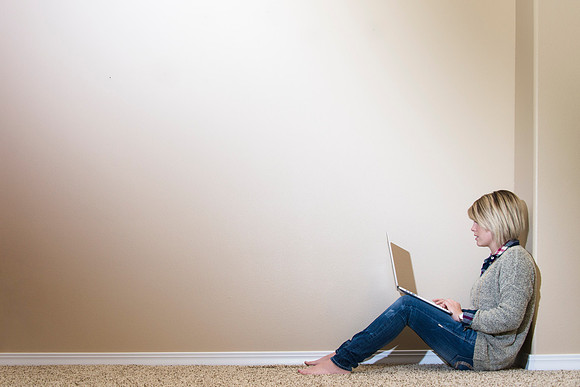 Online Student, Chance Beattie, works on assignments at home.