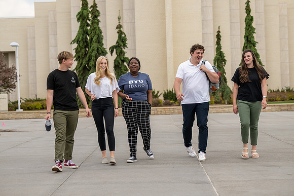Student models for Admissions Viewbook cover options. May 2023