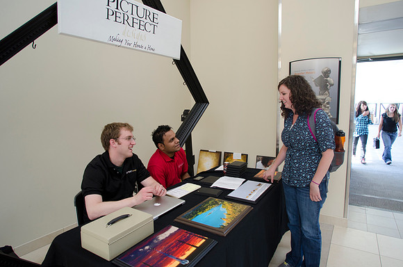 Students from the Business Department sell pictures to make a "house a home."