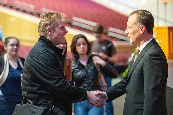 Students gather for devotional in the BYU-Idaho Center with Elder Kyle S McKay, General Authority Seventy.