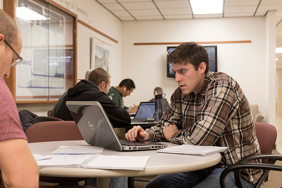 The study nook outside the Physics Department office is often filled with busily studying students.