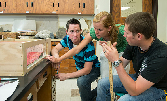 Nicole Rider, Jon Schmidt and Ryan Ronson work together on a Structural Geology Lab assignment: Analog modeling of thrust faults and compression.