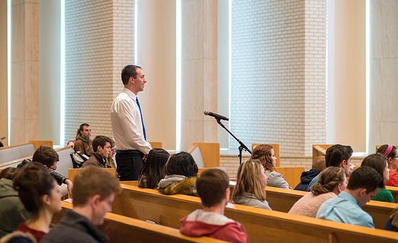 President Gilbert listens and answers questions from students during a Q&A.