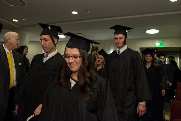Graduates gather in the I-Center for ​Commencement.