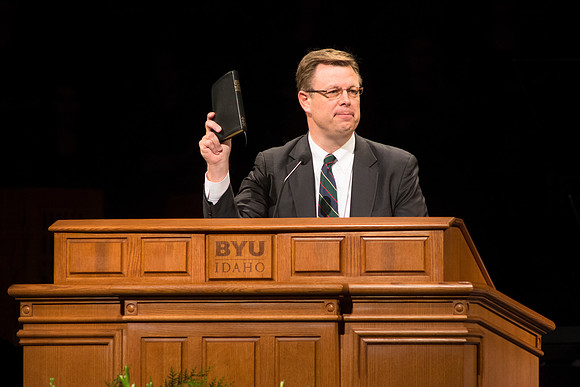 President Gilbert invites and shows preparedness for devotional speaker.