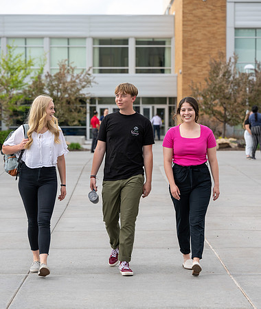 Student models for Admissions Viewbook cover options. May 2023