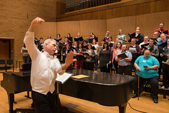 Ricks College Alumni from 1965 to 1995 gather for an A Cappella Choir reunion.