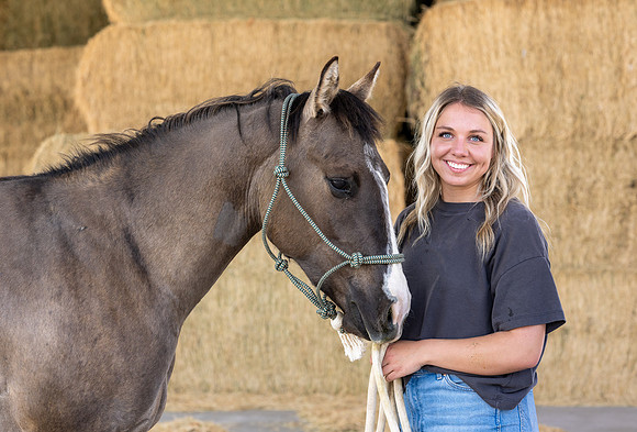 Rilie Vanderwiel, studying Animal Science, is right at home at the BYU-Idaho Animal Science Center.