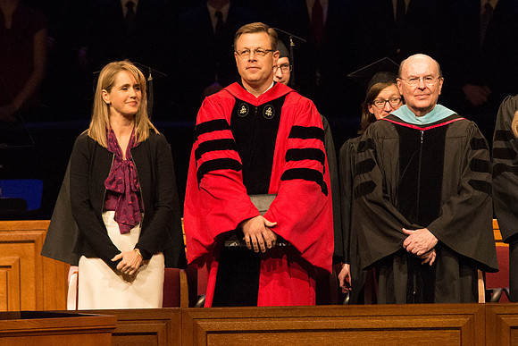 President Clark G. Gilbert and Elder Quentin L. Cook walking out in the graduation processional