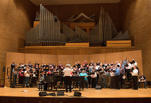 Ricks College Alumni from 1965 to 1995 gather for an A Cappella Choir reunion.