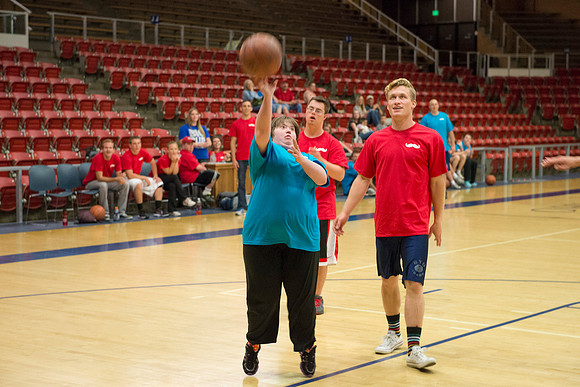 Bob Christensens Special Education class puts on a great show in the Hart Gym playing basketball.