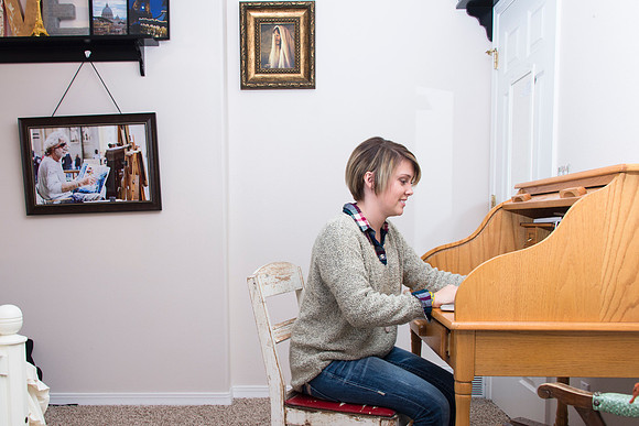 Online Student, Chance Beattie, works on assignments at home.