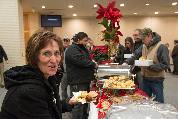 Employees gather for good food and friends.