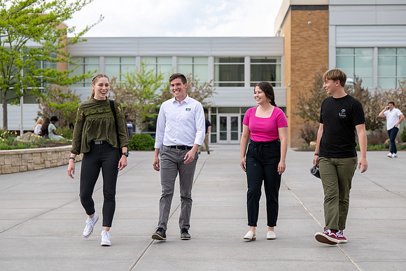 Student models for Admissions Viewbook cover options. May 2023