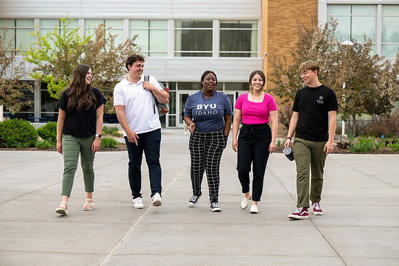 Student models for Admissions Viewbook cover options. May 2023