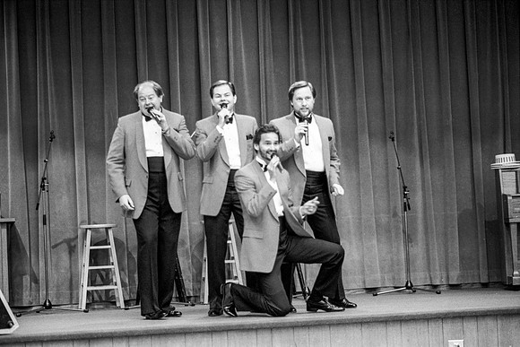 The barbershop quartet sings a number at the Banquet