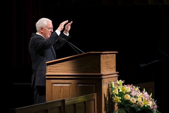 Elder Marlin K Jensen speaks at a devotional held in the Hart Auditorium for 2013 Education Week.