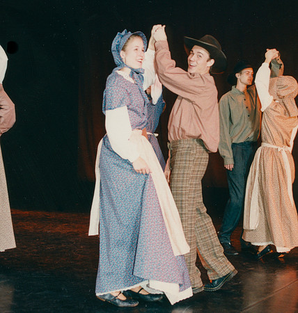 Folk dancers perform.