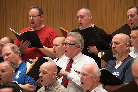 Ricks College Alumni from 1965 to 1995 gather for an A Cappella Choir reunion.