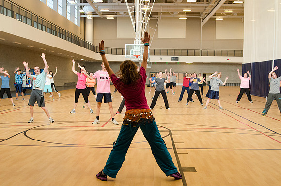 Instructor Stephanie Fay leads an early morning Zumba class during Education Week 2013. Photo by Taylor Davenport