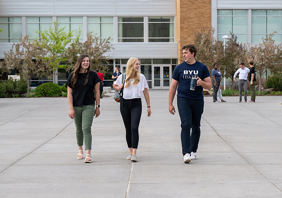 Student models for Admissions Viewbook cover options. May 2023
