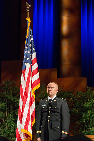 LT. Hoggan posts the colors to begin the commencement ceremony.