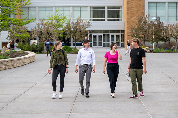 Student models for Admissions Viewbook cover options. May 2023
