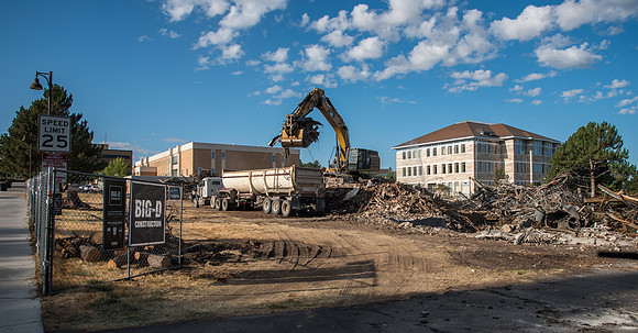 Remnants of the old Kirkham Building being hauled away.