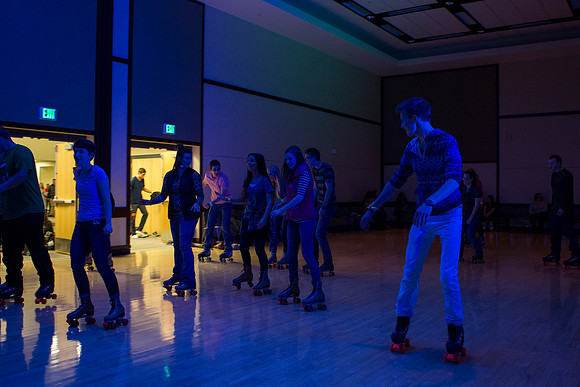 Students rollerblade during I-Night in the MC Building.