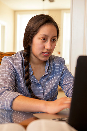 Tanya Rickenbach studies online at BYU-Idaho in her quiet apartment.