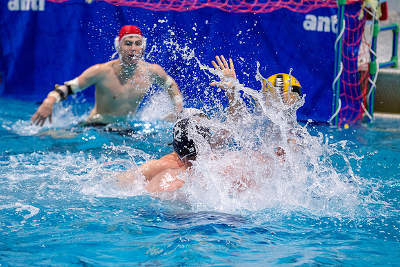 The BYU-Idaho competitive sports teams battle it out on the surface in an intense water polo game.