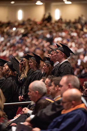 Student Graduates and Faculty meet in the I-Center for Commencement.