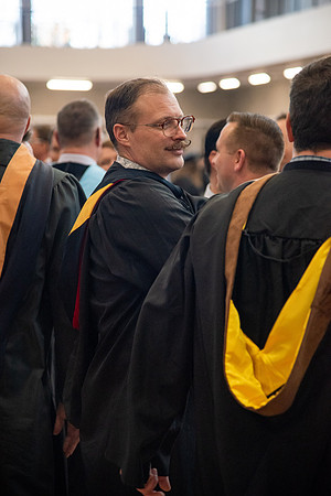 Student Graduates and Faculty meet in the I-Center for Commencement.