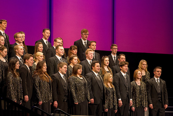 The University Choir sings, "I'll Go Where You Want Me To Go," during devotional.