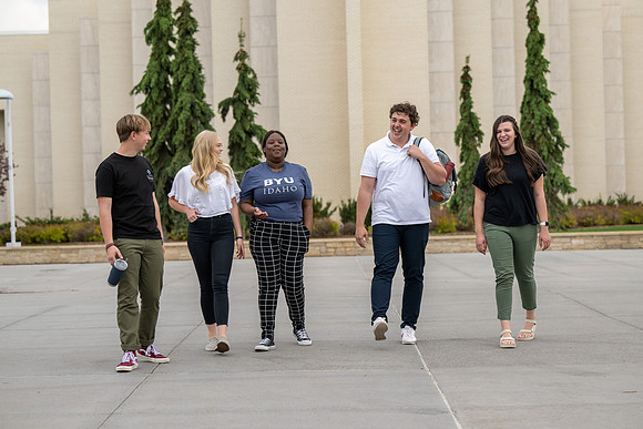 Student models for Admissions Viewbook cover options. May 2023