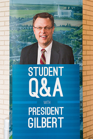 President Gilbert listens and answers questions from students during a Q&A.