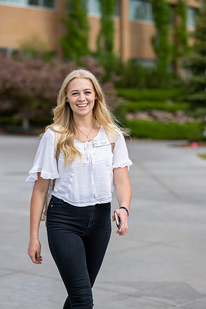 Student models for Admissions Viewbook cover options. May 2023