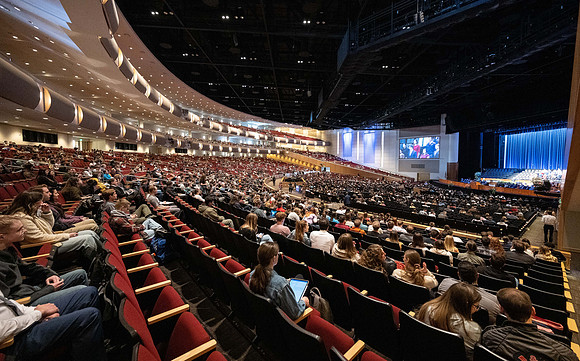 Students gather for devotional in the BYU-Idaho Center with Elder Kyle S McKay, General Authority Seventy.