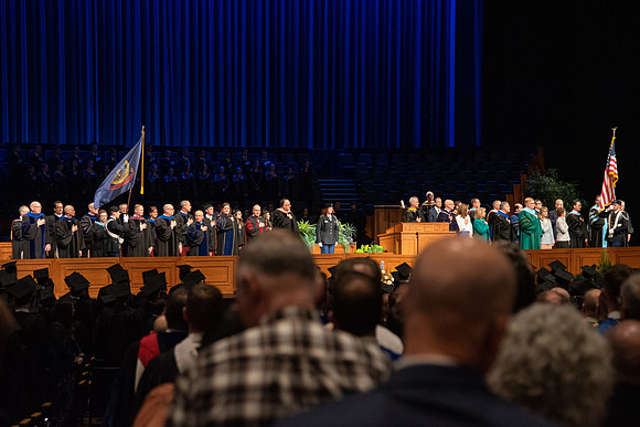 Student Graduates and Faculty meet in the I-Center for Commencement.