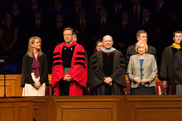 President Clark G. Gilbert and Elder Quentin L. Cook walking out in the graduation processional