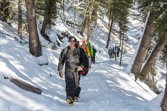 Jimmy Weed and other students hiking down to go ice climbing as part of Outdoor Activities.